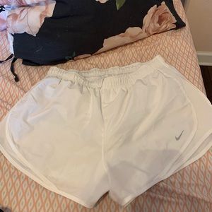 White Nike shorts